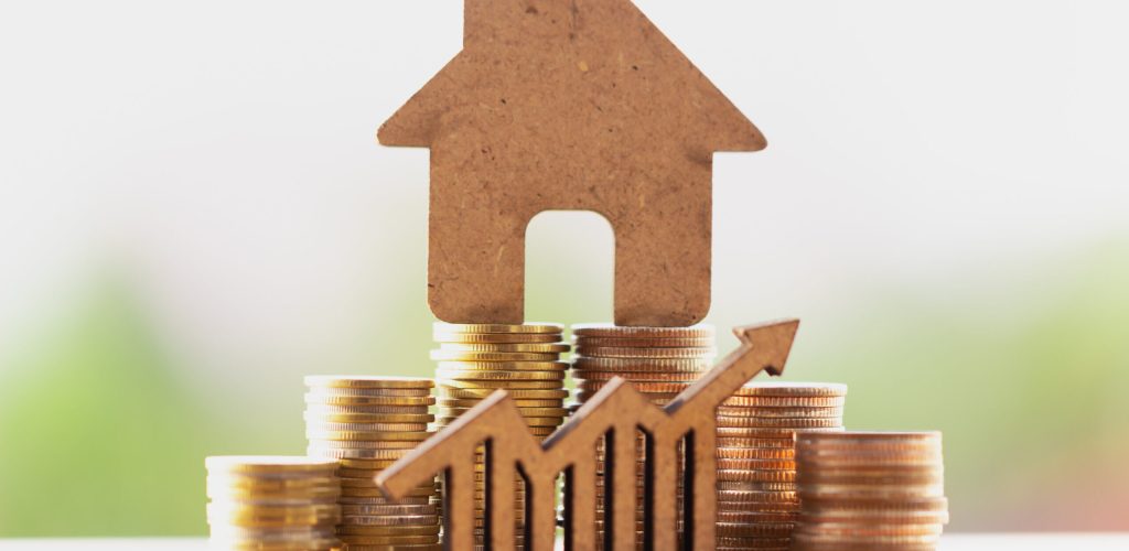 House,And,Coins,Stack,For,Saving,To,Buy,A,House. House,And,Coins,Stack,For,Saving,To,Buy,A,House.